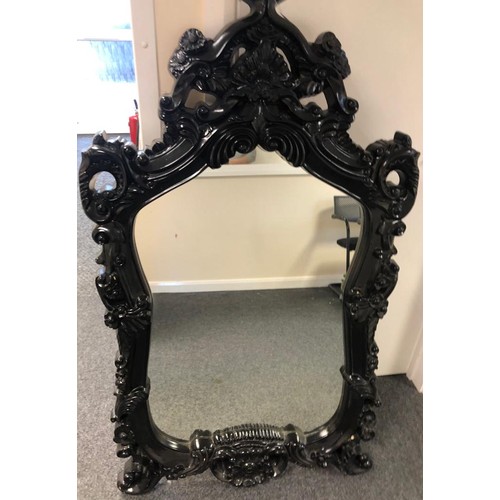 124 - Large vintage mirror with black ornamental around size 138x82cm
