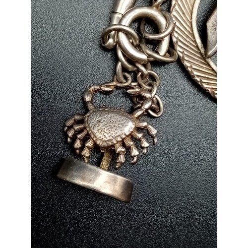 686 - Part of a Vintage Sterling Silver Charm Bracelet. Includes a mini pencil holder. 12.5g.