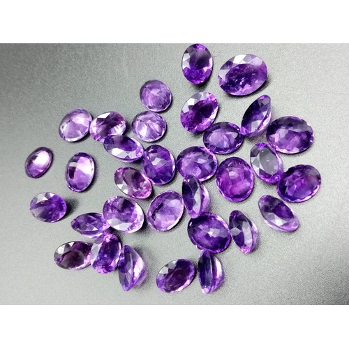 725 - Parcel of 32 oval cut amethysts total weight 94.4cts