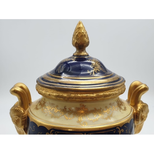 196 - A Coalport Porcelain Vase and Cover. Stunning Gilt and Cobalt Blue with a Hand-painted Scene of Duno... 