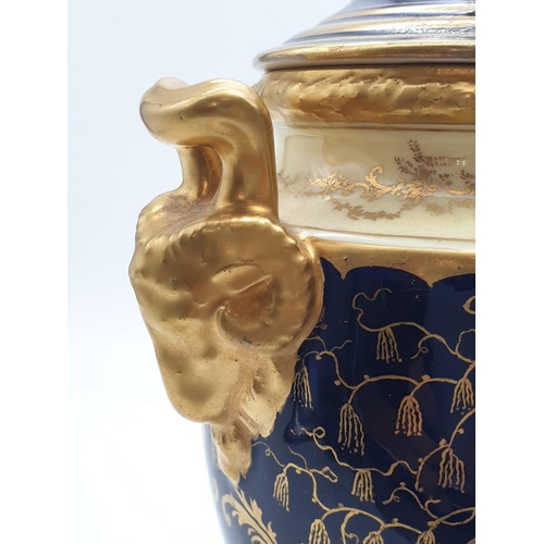 196 - A Coalport Porcelain Vase and Cover. Stunning Gilt and Cobalt Blue with a Hand-painted Scene of Duno... 