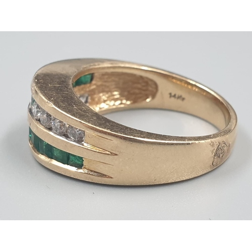 204 - 14K Gold Ring with Channel set Emeralds and Diamonds. 6.2g total weight. Size N.