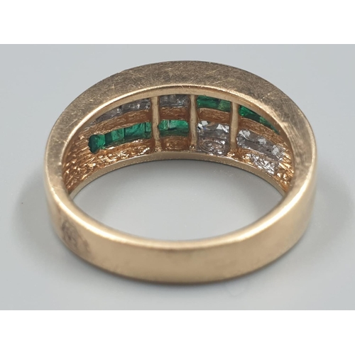 204 - 14K Gold Ring with Channel set Emeralds and Diamonds. 6.2g total weight. Size N.