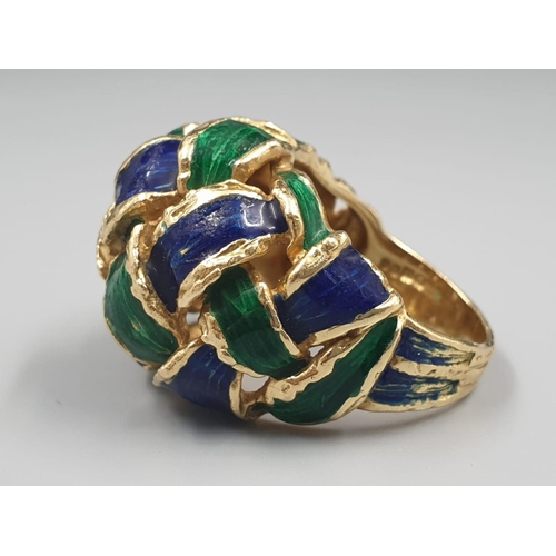 242 - 18k Gold, and Enamel Ring by Kuchinski.
16.4g total weight. Size N