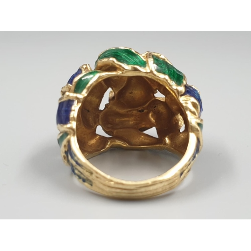 242 - 18k Gold, and Enamel Ring by Kuchinski.
16.4g total weight. Size N