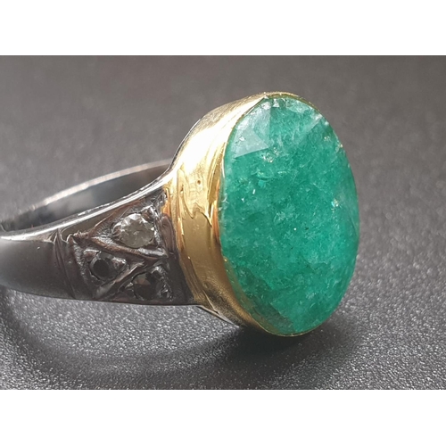 364 - 10ct emerald ring with rose cut diamonds, two tone finish, the emerald has been set in 9kt yellow go... 