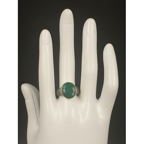 364 - 10ct emerald ring with rose cut diamonds, two tone finish, the emerald has been set in 9kt yellow go... 