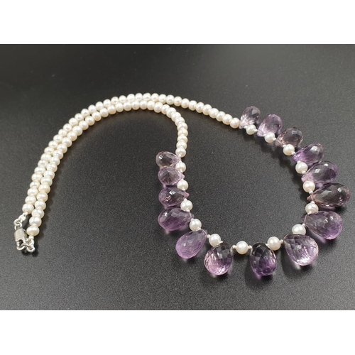 392 - A 4mm freshwater pearl necklace with Amethyst drops , sterling silver clasp