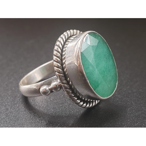 512 - A emerald ring in vintage style. Size P/Q