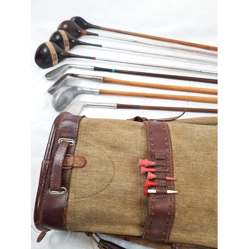 197 - A VINTAGE GOLF BAG CONTAINING 8 CLUBS OF VARIOUS AGES INCLUDING 5 WOODEN AND HICKORY SHAFTED 2