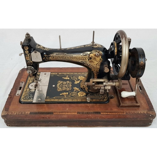 198 - A FINELY DECORATED ANTIQUE SEWING MACHINE IN WOODEN CARRYING CASE MADE BY FRISTER AND ROSSMAN CICA 1... 