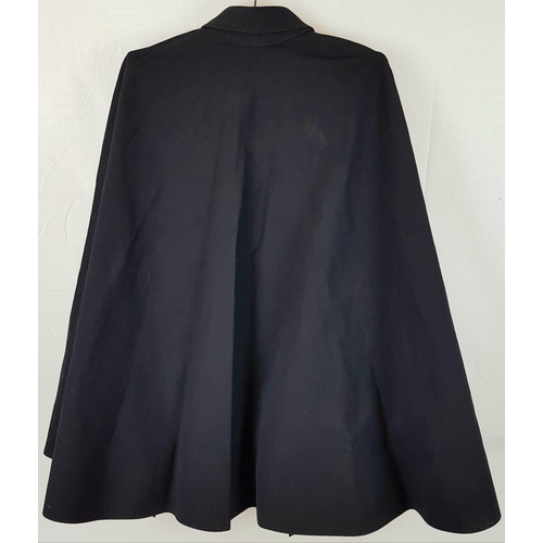 95 - A METROPOLITAN POLICEMANS WEATHERPROOF CAPE
FROM THE 50'S OR 60'S