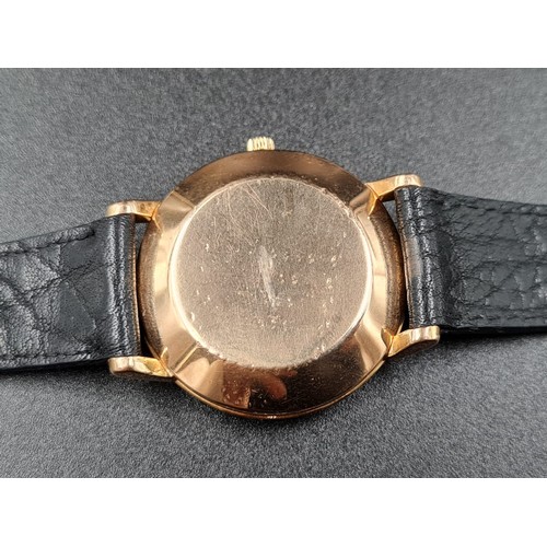 298 - VINTAGE OMEGA AUTOMATIC GENTS WATCH IN 18CT ROSE GOLD TWO TONE DIAL ON A LEATHER STRAP. 36MM