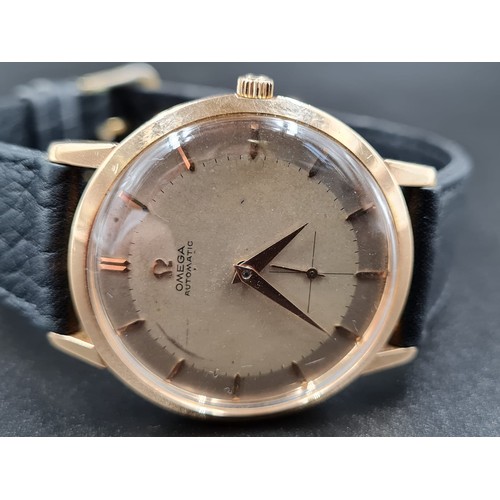 298 - VINTAGE OMEGA AUTOMATIC GENTS WATCH IN 18CT ROSE GOLD TWO TONE DIAL ON A LEATHER STRAP. 36MM