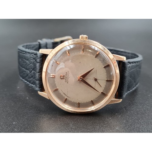 298 - VINTAGE OMEGA AUTOMATIC GENTS WATCH IN 18CT ROSE GOLD TWO TONE DIAL ON A LEATHER STRAP. 36MM