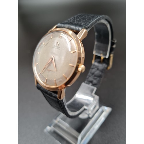 298 - VINTAGE OMEGA AUTOMATIC GENTS WATCH IN 18CT ROSE GOLD TWO TONE DIAL ON A LEATHER STRAP. 36MM