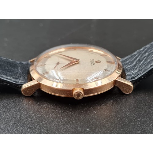 298 - VINTAGE OMEGA AUTOMATIC GENTS WATCH IN 18CT ROSE GOLD TWO TONE DIAL ON A LEATHER STRAP. 36MM