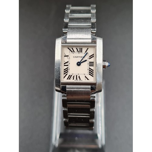 305 - A LADIES CARTIER TANK STYLE WATCH WITH QUARTZ MOVEMENT , ROMAN NUMERALS AND SAPHIRE WINDER 24MM