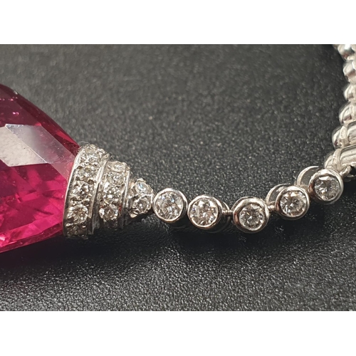 363 - a pair of 18ct white gold earrings with diamonds and a 6.5cm DROP TO NICELY CUT PINK TOURMALINE STON... 