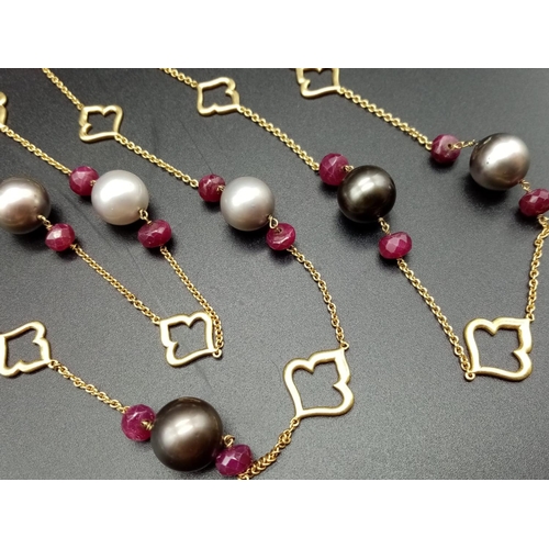 533 - AN 18CT GOLD NECKLACE WITH RUBY AND TAHITION PEARLS MEASURING 125 cms IN LENGTH AND WEIGHING 55.6 gm... 