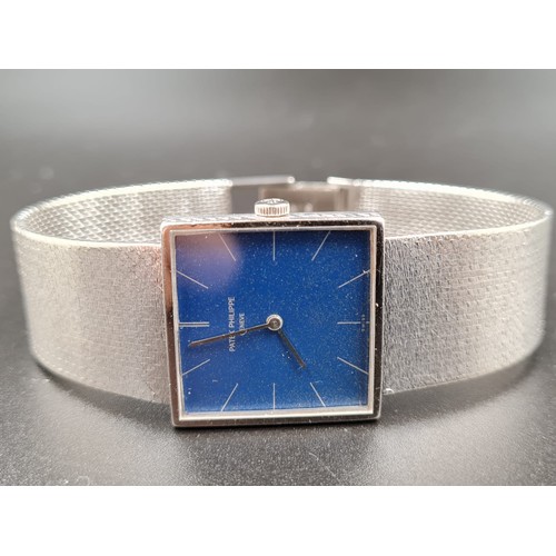 550 - PATEK PHILIPPE 18CT WHITE GOLD GENTS DRESS WATCH WITH SOLID GOLD STRAP, SQUARE BLUE FACE
AND MANUEL ... 