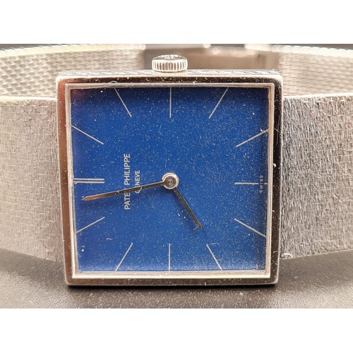 550 - PATEK PHILIPPE 18CT WHITE GOLD GENTS DRESS WATCH WITH SOLID GOLD STRAP, SQUARE BLUE FACE
AND MANUEL ... 