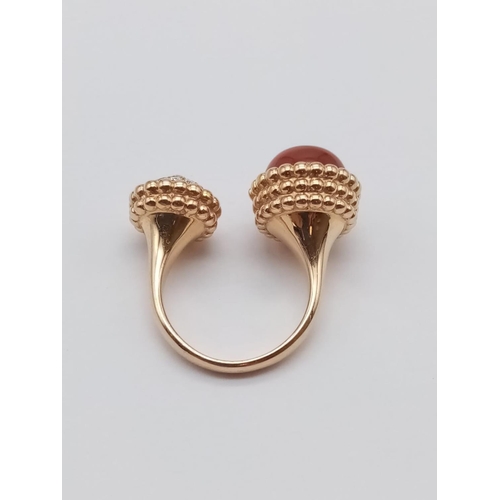 557 - AN UNUSUAL DOUBLE FACED DRESS RING IN 18CT ROSE GOLD WITH CARNELIAN AND DIAMONDS.
FITS ANY SIZE   9.... 