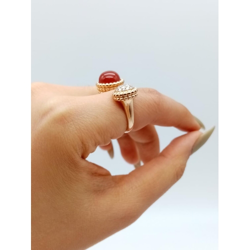 557 - AN UNUSUAL DOUBLE FACED DRESS RING IN 18CT ROSE GOLD WITH CARNELIAN AND DIAMONDS.
FITS ANY SIZE   9.... 