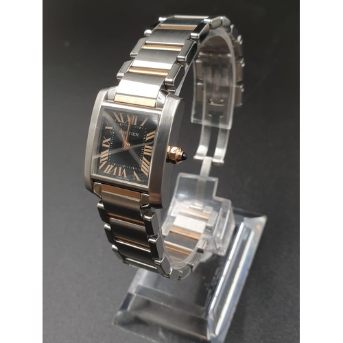 578 - A CARTIER TANK STYLE WATCH WITH BI-COLOURED STAINLESS STEEL STRAP, BLACK FACE WITH ROSE GOLD COLOURE... 