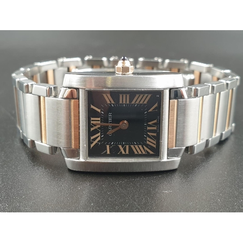 578 - A CARTIER TANK STYLE WATCH WITH BI-COLOURED STAINLESS STEEL STRAP, BLACK FACE WITH ROSE GOLD COLOURE... 