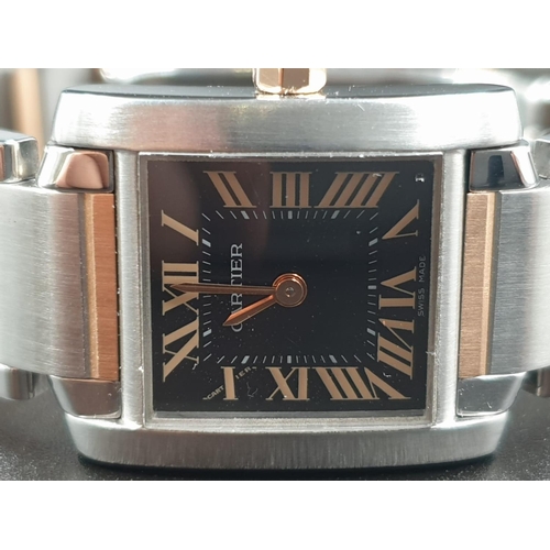 578 - A CARTIER TANK STYLE WATCH WITH BI-COLOURED STAINLESS STEEL STRAP, BLACK FACE WITH ROSE GOLD COLOURE... 