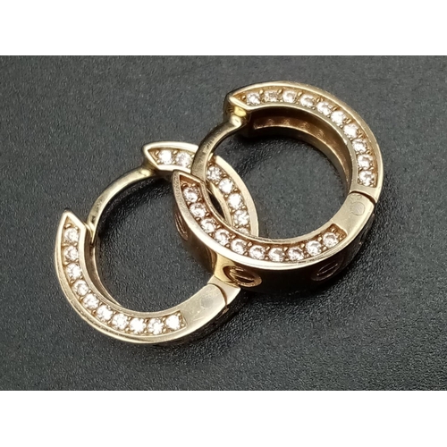 584 - 9CT YELLOW GOLD CZ SET CARTIER STYLE MINI HOOP EARRINGS, WEIGHT 4.8G