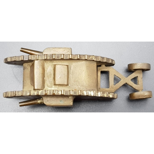 736 - WW1 Trench-Art Brass Tank. Duel Movable Guns. Wheels on rear, 13 x 3cm.