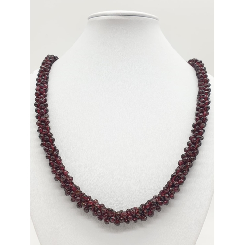 680 - Garnet NECKLACE with 9ct Gold Clasp.  80g  52cm