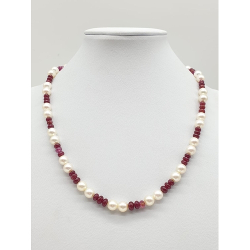 715 - Ruby and Cultured Pearl NECKLACE.  9ct Gold Clasp.   23g    40cm