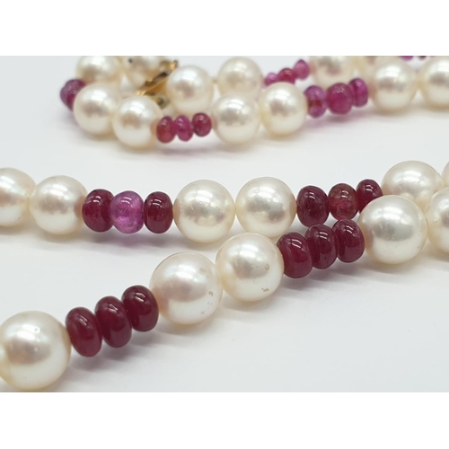 715 - Ruby and Cultured Pearl NECKLACE.  9ct Gold Clasp.   23g    40cm