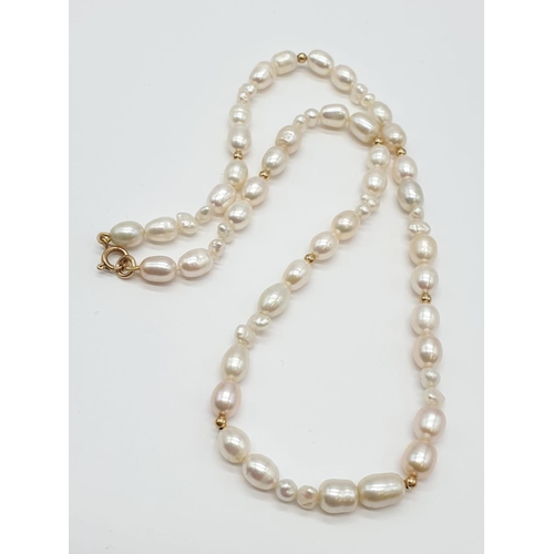 722 - Freshwater Pearl and 9ct Gold NECKLACE.  27.1g   42cm