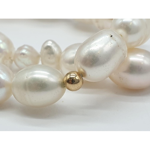 722 - Freshwater Pearl and 9ct Gold NECKLACE.  27.1g   42cm