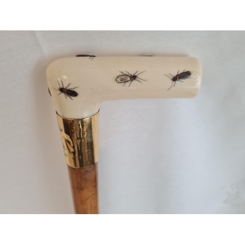 290 - AN ANTIQUE VICTORIAN WALKING STICK WITH CARVED IVORY HANDLE AND 18CT GOLD BAND.
92CMS IN HEIGHT