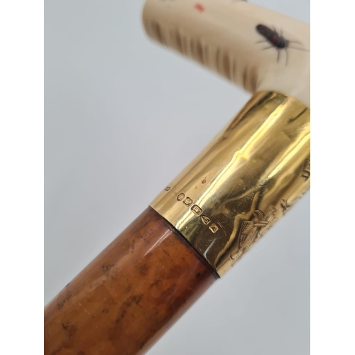 290 - AN ANTIQUE VICTORIAN WALKING STICK WITH CARVED IVORY HANDLE AND 18CT GOLD BAND.
92CMS IN HEIGHT