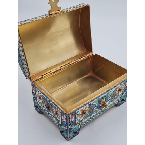 276 - An Antique Russian Silver-Gilt and Enamel Trinket Box. Of Rectangular form with hinged lid and hinge... 