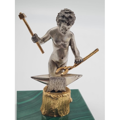 171 - A 20TH CENTURY ITALIAN SILVER AND MALACHITE FIGURINE OF A NAKED BLACKSMITH STANDING 10CMS TALL AND W... 