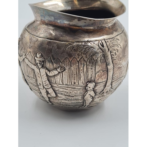 131 - 19TH CENTURY GERMAN SILVER BOWL PORTRAYING VILLAGE LIFE. 75.7gms AND 7.5cms IN HEIGHT