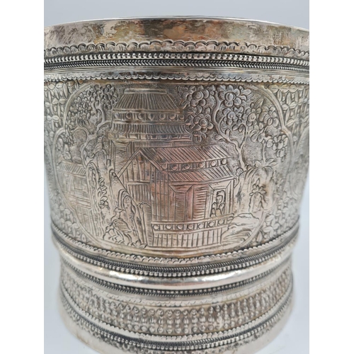 757 - A 19th Century Burmese Silver Nut Container. Elegantly decorated with repousse work. 1100g. No Hallm... 