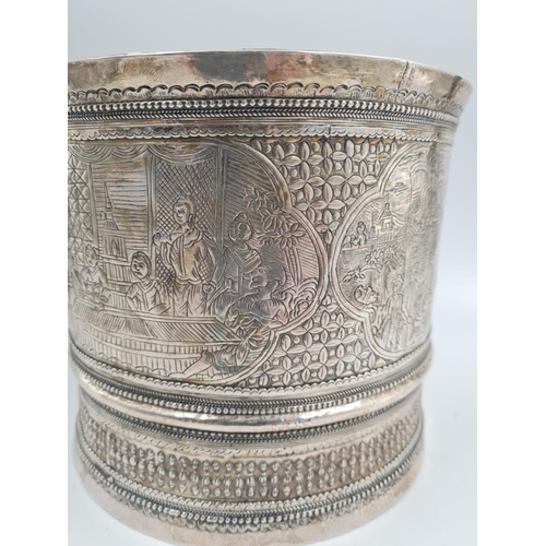 757 - A 19th Century Burmese Silver Nut Container. Elegantly decorated with repousse work. 1100g. No Hallm... 