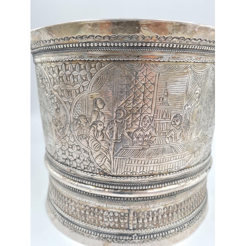 757 - A 19th Century Burmese Silver Nut Container. Elegantly decorated with repousse work. 1100g. No Hallm... 