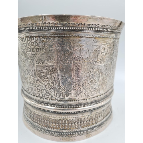 757 - A 19th Century Burmese Silver Nut Container. Elegantly decorated with repousse work. 1100g. No Hallm... 