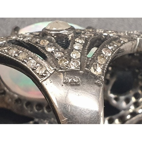 771 - AN UNUSUAL SILVER ART DECO STYLE DRESS RING ADORNED WITH DIAMONDS(APPROX 3CT) WITH A  LARGE 6 CT aus... 