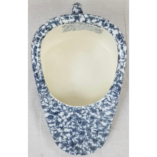 796 - A blue and white porcelain NEW SLIPPER BED PAN by  Maw Son & Thomson  London. This was the luxury mo... 