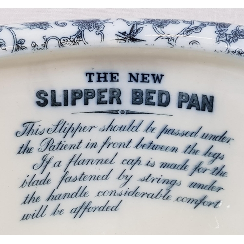 796 - A blue and white porcelain NEW SLIPPER BED PAN by  Maw Son & Thomson  London. This was the luxury mo... 